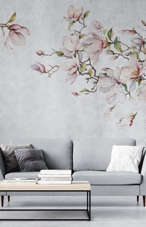  Beautiful blooming magnolia branches on a concrete wall. Mural in subdued colors.