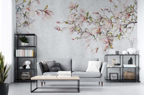  Beautiful blooming magnolia branches on a concrete wall. Mural in subdued colors.