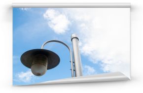 street lamp post new style design and blue sky and white clouds . space for text background