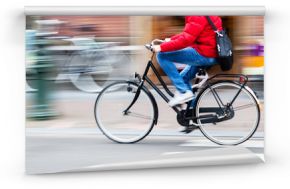 rowerzysta w mieście w ruchu rozmycie