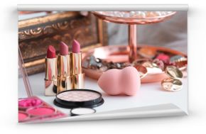 Decorative cosmetics on dressing table in makeup room