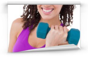 Fit woman lifting blue dumbbell