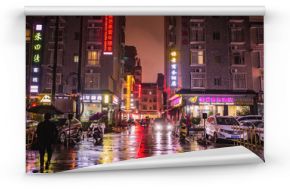 zhangjiajie/China - 13 October 2018:Beautiful city of Zhangjiajie city in the night with the rain in holiday time.sightseeing Building in the night time of zhangjiajie City china