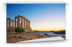Greece. Cape Sounion - Ruins of an ancient Greek temple of Poseidon after sunset