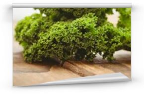 Close-up of parsley on wooden board 