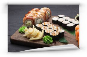 Large set of sushi with soy sauce and wasabi