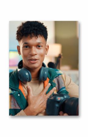 Influencer, content creator and portrait of man with camera for tech review, feedback or vlog. Live streaming, social media and person talking for recording video, podcast and opinion to audience