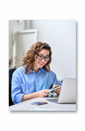 Young happy business woman hr manager coach looking at laptop talking leading hybrid conference online remote video call, virtual work interview meeting or online training working in office, vertical.