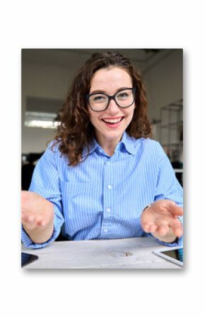 Web cam view of happy young business woman leader, coach, hr manager talking to web camera having online job interview, remote video conference call or leading work webinar sitting in office.