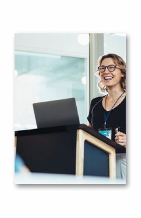 Confident woman leading presentation at business event