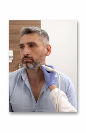 Sick man looking for causes of headache while getting ultrasound scan of neck vessels to find diagnosis. Vascular ultrasound, close-up