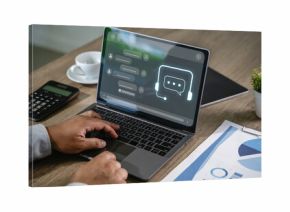 Businessman using AI chatbot interface on laptop for digital contact center support chatbot technology assisting