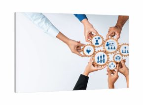 A dynamic visual representation of teamwork, showcasing diverse hands collaborating with graphic gear icons, symbolizing innovation and business strategy on a light background. Amity