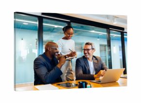 Business professionals sharing ideas and working together in office setting