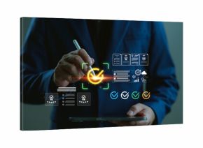 Businessman using digital certification and quality assurance interface. Concept of standardization, compliance, document approval, verified checkmark, audit process, and digital validation system.