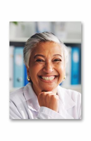 Portrait, doctor and woman with smile in office, hospital and pride for healthcare services or help. Confident, mature person and medical professional with happiness in clinic, specialist and USA