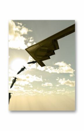 B-2 Spirit, Stealth Bomber, heavy strategic bomber, stealth technology designed to penetrate dense anti-aircraft defenses and GBU-57 MOP (Massive Ordnance Penetrator) bunker buster bomb. 3d rendering