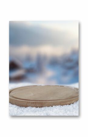 Empty copy space on fresh snow with background of frozen winter mountains and clear blue sky on sunny day. Concept of winter holidays, seasonal product placement, cold weather and mountain nature.