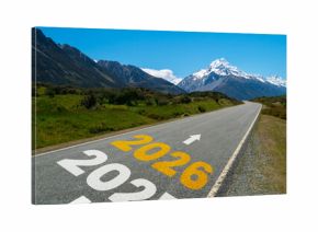2026 New Year road trip travel and future vision concept . Nature landscape with highway road leading forward to happy new year celebration in the beginning of 2026 for glee and successful start .