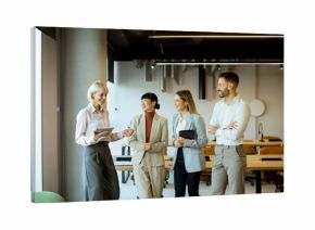 Business team discusses project ideas in modern office space during daytime meeting