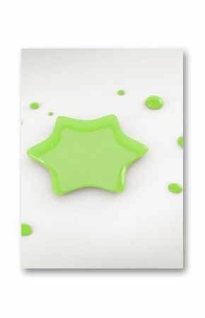 Showing glossy green star shaped liquid spreading on white table with droplets, minimal flat design