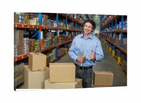 Metal shelving racks holding packed boxes and canned goods lining warehouse aisle under lights