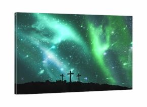 Cross religion symbol shape over sky with aurora borealis