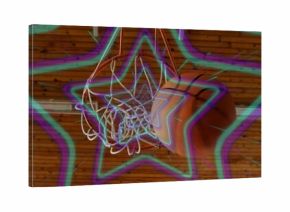 Shooting basketball passing through hoop rim under wooden ceiling, with neon star overlay
