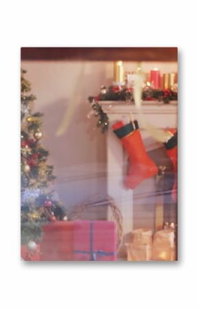 Image of glowing lights moving over fir tree cones and lantern christmas decorations
