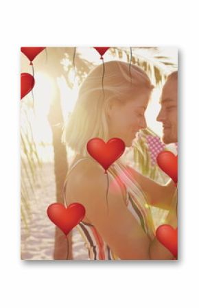 Image of heart icons over couple in love on beach