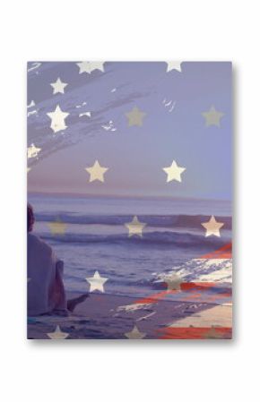 Image of american flag over happy diverse couple wrapped in rug embracing sat on sunset beach