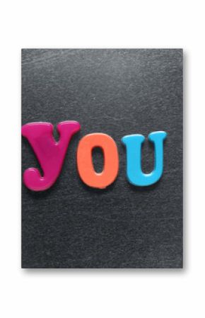 word you spelled out using colored fridge magnets