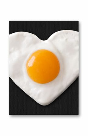 fried egg shaped to heart on teflon pan