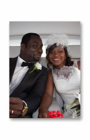 Happy newlyweds of beautiful bride woman in car for wedding black couple