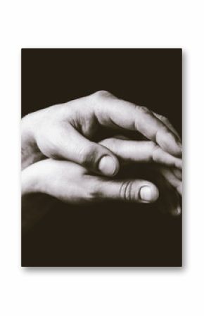 A gentle touch of two hands. Concept of LGBT love, caring, tolerance, etc. Black and white, toned image.