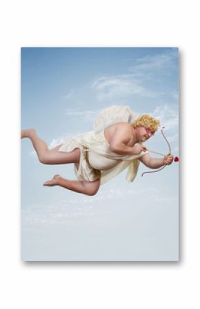 Funny overweight cupid aiming with the arrow of love over clear blue sky with copy space