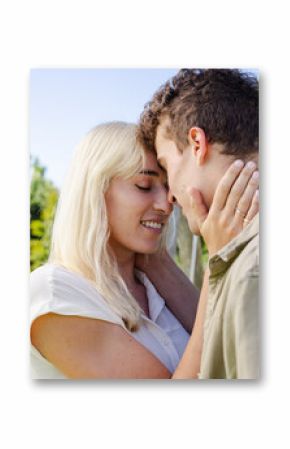 Embracing in garden, couple sharing intimate moment during wedding celebration