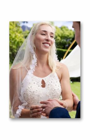 Bride smiling joyfully while exchanging vows during outdoor wedding ceremony