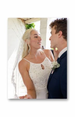 Bride and groom sharing romantic moment while dancing at wedding reception