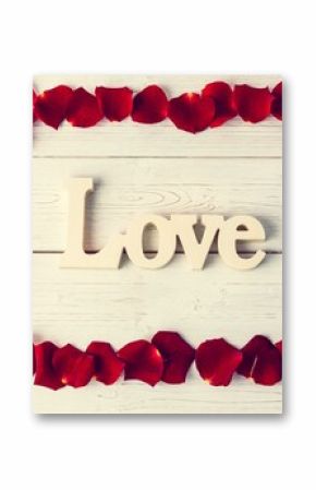 Frame of rose petals with love text