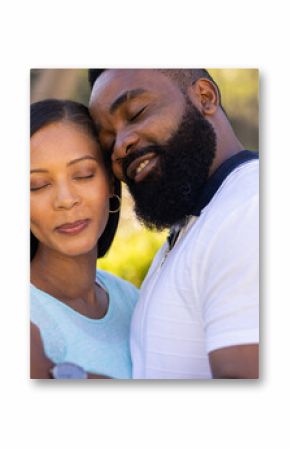 Embracing and dancing together, couple enjoying peaceful moment outdoors