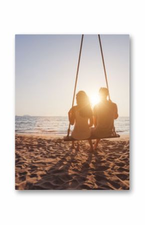 beach holidays for romantic young couple, honeymoon vacations, silhouettes of man and woman sitting together on swing and enjoying sunset