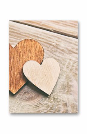 One wooden hearts on the wooden table