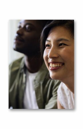Smiling couple enjoying joyful moment together at wedding celebration indoors