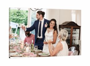 Bride and groom toasting with guests at elegant wedding reception indoors