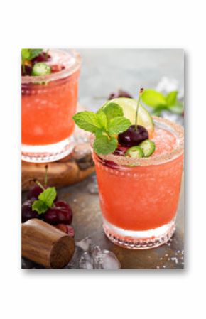 Refreshing summer cocktail with cherry