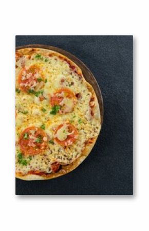 Fresh pizza served on black table