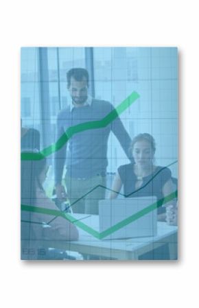 Collaborating five professionals viewing trending line graphs on open laptop in glass walled office