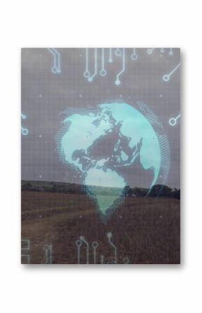 Projecting glowing Earth hologram over plowed field with circuit traces, bar chart and grid overlay