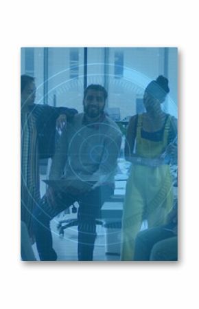 Five coworkers collaborating around desk in modern office, with laptop and holographic overlay